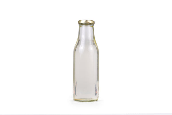 Coconut oil in glass bottle for representation purpose only