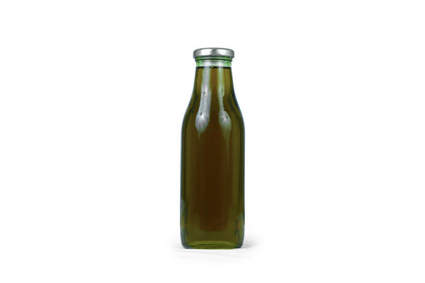 Mustard oil in glass bottle for representation purpose only