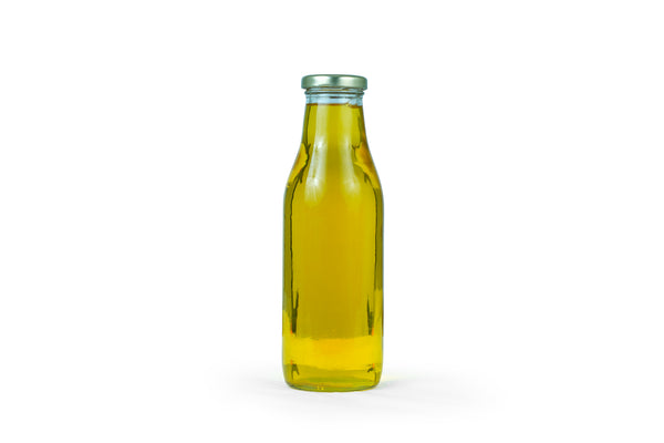 Safflower oil in glass bottle for representation purpose only